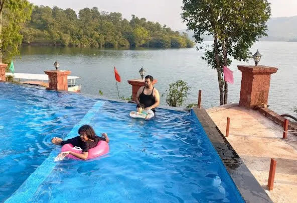 Guests enjoying the infinity pool